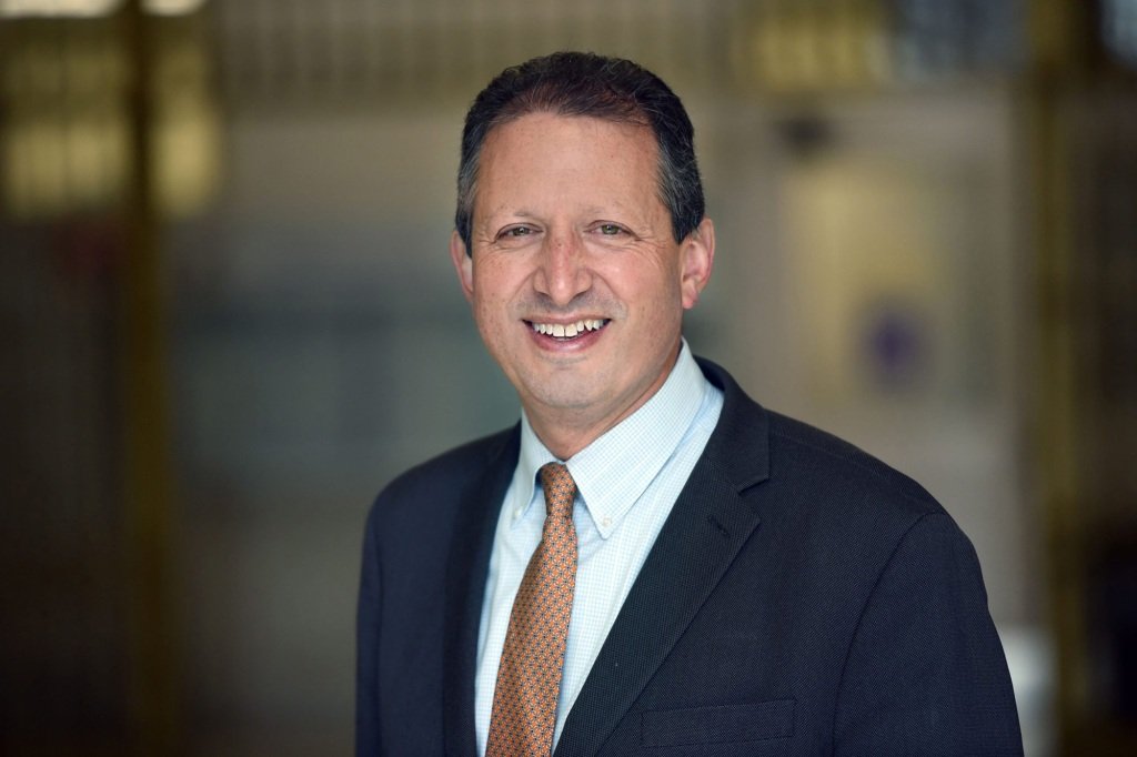 brad lander smiles in a suit