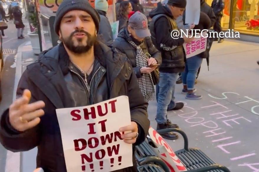 A man who confronted a group of anti-Drag Story Hour protesters at a Manhattan library Saturday afternoon was arrested after allegedly getting into a tussle with an officer monitoring the demonstration, police said.