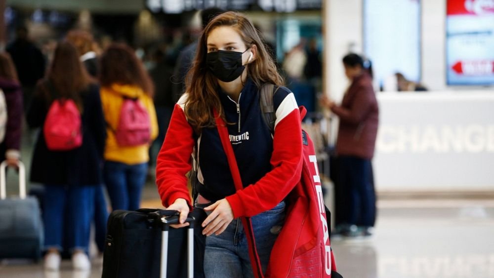 Should you wear a mask on flights? WHO issues new recommendations as COVID variant spreads