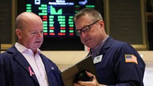 Dow climbs more than 200 points after December CPI report shows cooling inflation