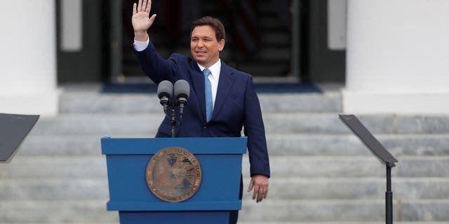 Florida's Governor Ron DeSantis after taking the oath of office waves to those in attendance at his second term inauguration in Tallahassee, Florida, U.S. January 3, 2023.