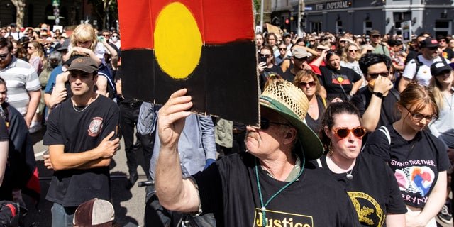 People participate in the 'Invasion Day' rally in Melbourne, January 26, 2023.
