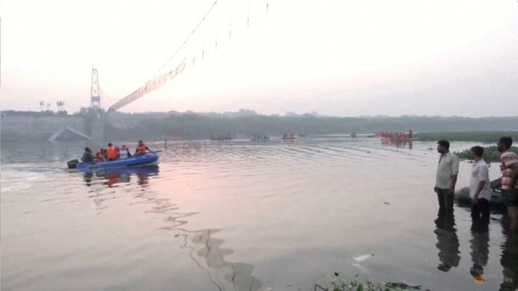 India police charge 10 with homicide over bridge collapse that killed 135