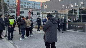 Tesla owners in China protest against price cuts