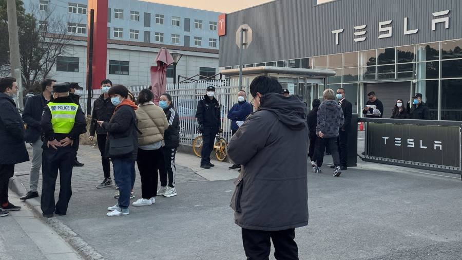 Tesla owners in China protest against price cuts