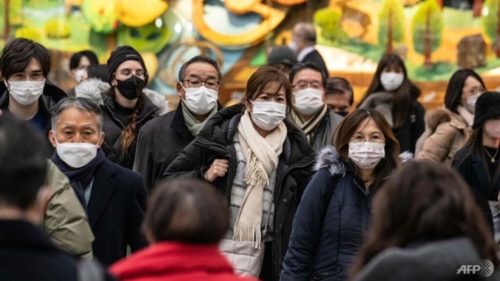Japan to drop mask guidance, relax COVID-19 strategy