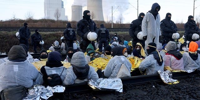 Activists block rail tracks to RWE's Neurath II lignite-fired power plant Following the eviction of L'tzerath, coal opponents continued their protests at several locations in North Rhine-Westphalia on Tuesday morning.