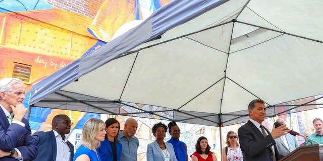 Xavier Becerra, Secretary of the Department of Health and Human Services, speaks during a press conference on the kickoff of 988, a new national mental health hotline, Friday, July 15, 2022, in Philadelphia. The press conference took place in front of the Contemplation, Clarity and Resilience mural by artist Eric Okdeh, which is a mural that represents, among many other things, the process of overcoming hardships. The United States’ first nationwide three-digit mental health crisis hotline (988) goes live on Saturday.