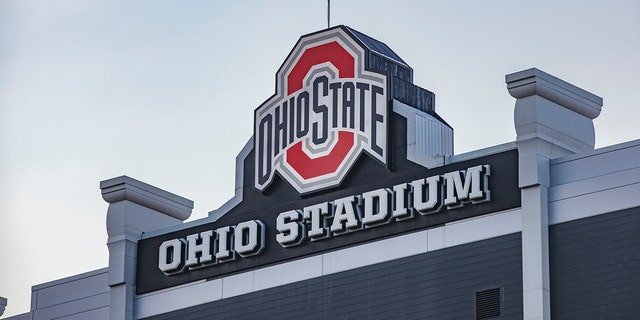 The Ohio State University logo at the top of the Ohio Stadium at sunset, during a summer day on The Ohio State University campus.