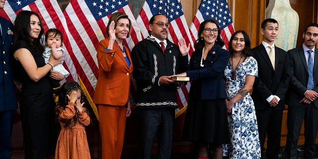 UNITED STATES - SEPTEMBER 13: Rep. Mary Peltola, D-Alaska, third from right, along with her family, participates in a swearing-in ceremony with Speaker of the House Nancy Pelosi, D-Calif., in the U.S. Capitol on Tuesday, September 13, 2022. 