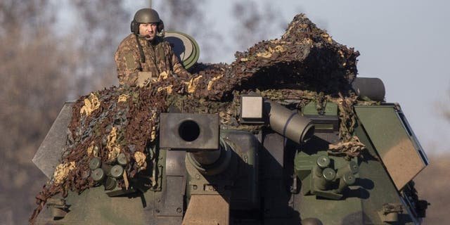 Ukrainian soldiers are seen on their ways to frontlines with their armoured military vehicles as the strikes continue on the Donbass frontline, during Russia and Ukraine war in Donetsk Oblast, Ukraine on Jan. 24, 2023.