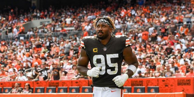 Myles Garrett, #95 of the Cleveland Browns, runs onto the field at halftime against the New York Jets at FirstEnergy Stadium on September 18, 2022, in Cleveland, Ohio.