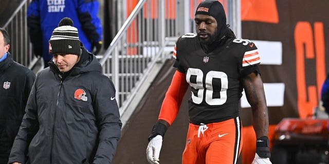 Cleveland Browns Jadeveon Clowney, #90 of the Cleveland Browns, leaves the game after being injured against the Baltimore Ravens during the first half at FirstEnergy Stadium on December 17, 2022, in Cleveland, Ohio.