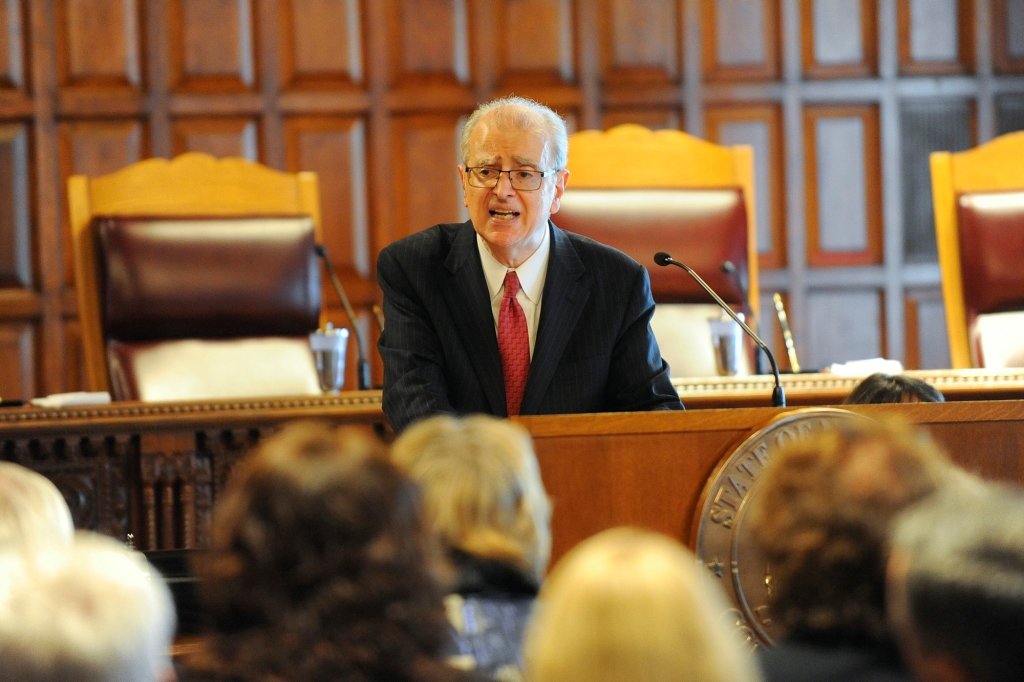 Lippman testifying at a hearing.