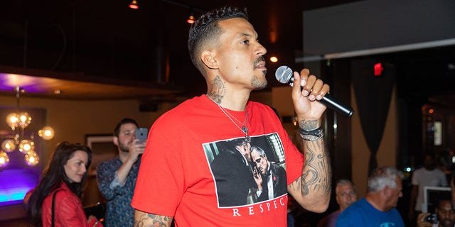 Matt Barnes speaks to a crowd at the Bowl 4 a Cure event hosted by him and Snoop Dogg at Lucky Strike Aug. 10, 2018, in Los Angeles.