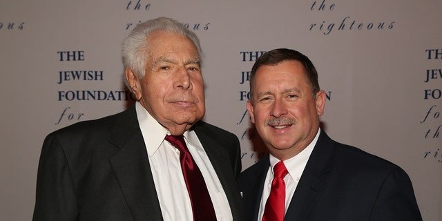 Lester Tanner (left) with Chris Edmonds, who learned how his own father, Roddie Edmonds, saved Tanner and other Jewish soldiers during the war.