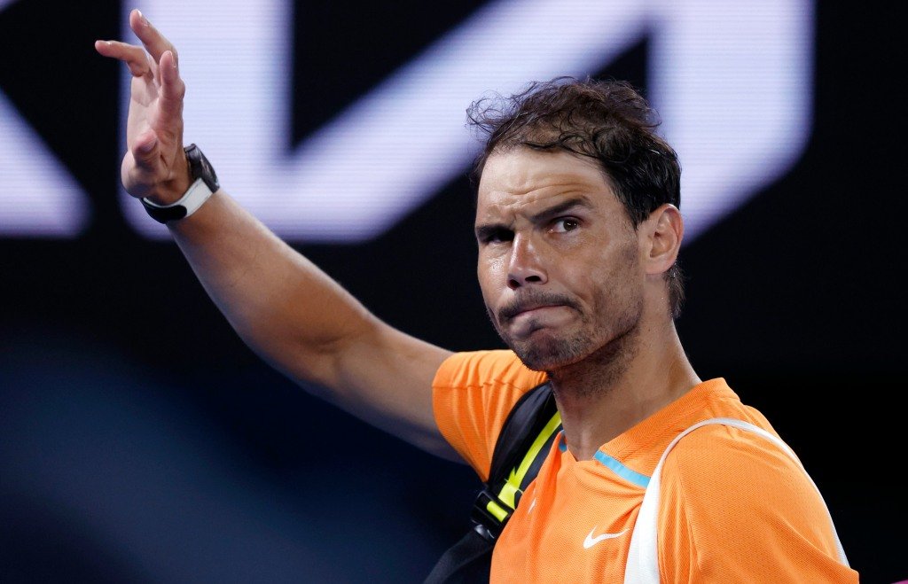 Rafael Nadal waves to the Australian Open crowd after his second-round upset loss.