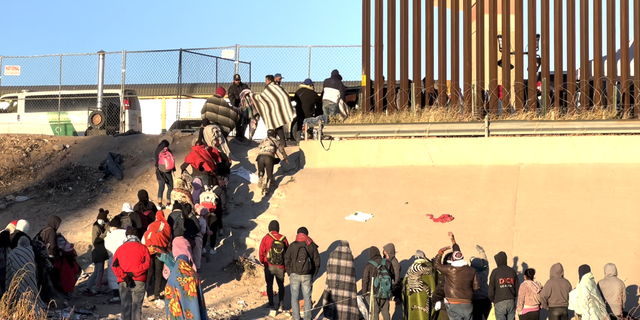 Migrants at the front of the line are processed for entry by U.S. Customs and Border Protection in El Paso, Texas.