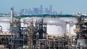 Global oil demand set to reach record high as China reopens, IEA says