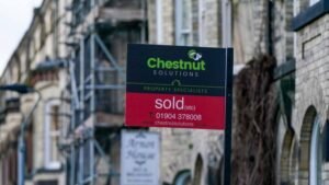 UK house prices suffer first monthly fall in over a year