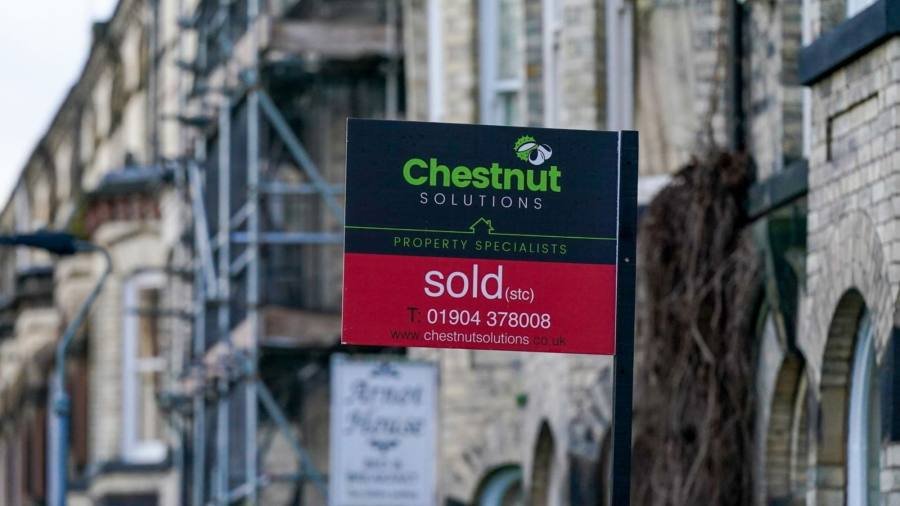UK house prices suffer first monthly fall in over a year