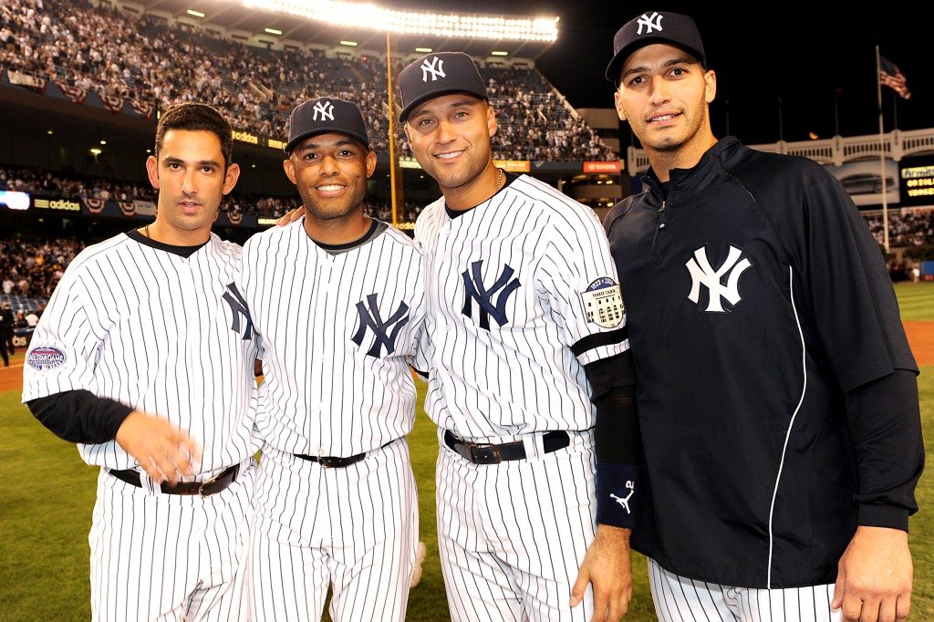Jorge Posada, Mariano Rivera, Derek Jeter and Andy Pettitte pose at the final game at Yankee Stadium in 2008.