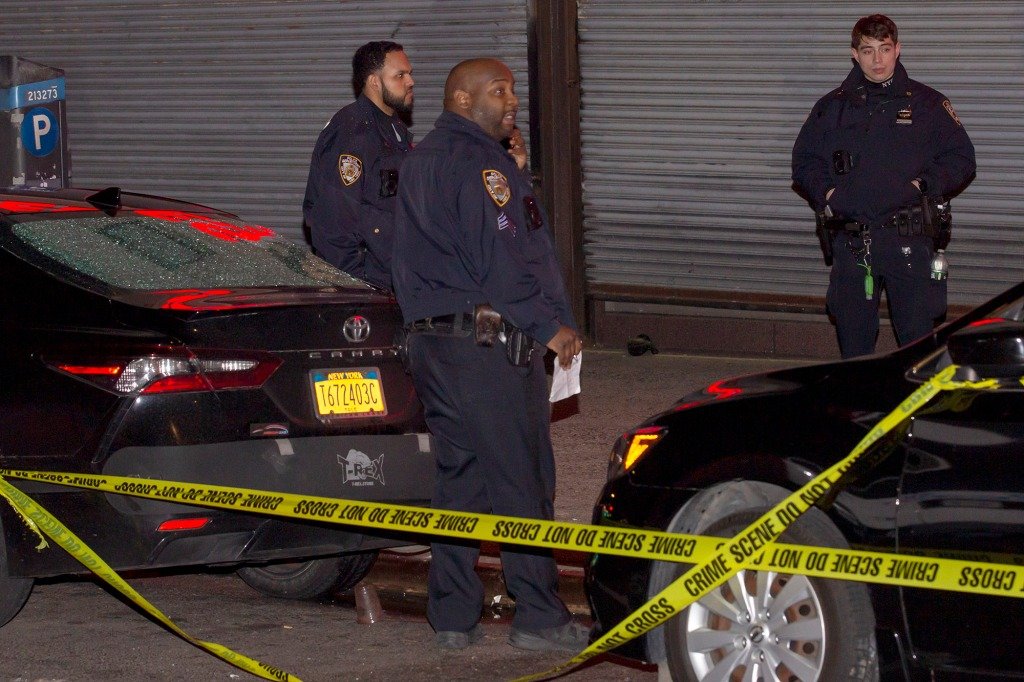 The scene of the shooting, where a bystander reports four to six shots were fired.