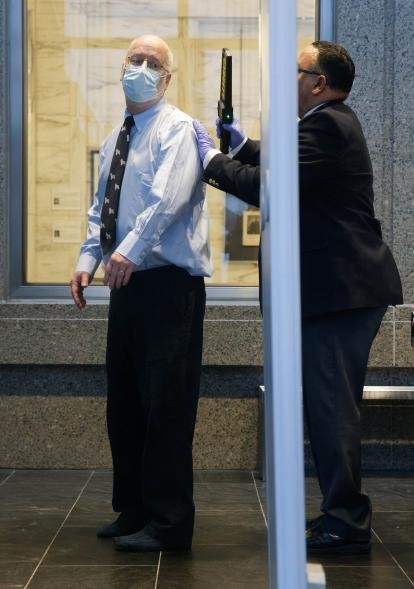 Robert Hadden is pictured receiving a security screening inside the Daniel Patrick Moynihan United States Courthouse on January 9.