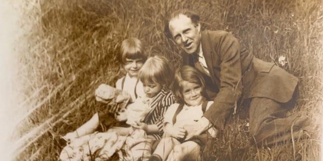George Bourlet and his children are shown in this picture from decades ago.