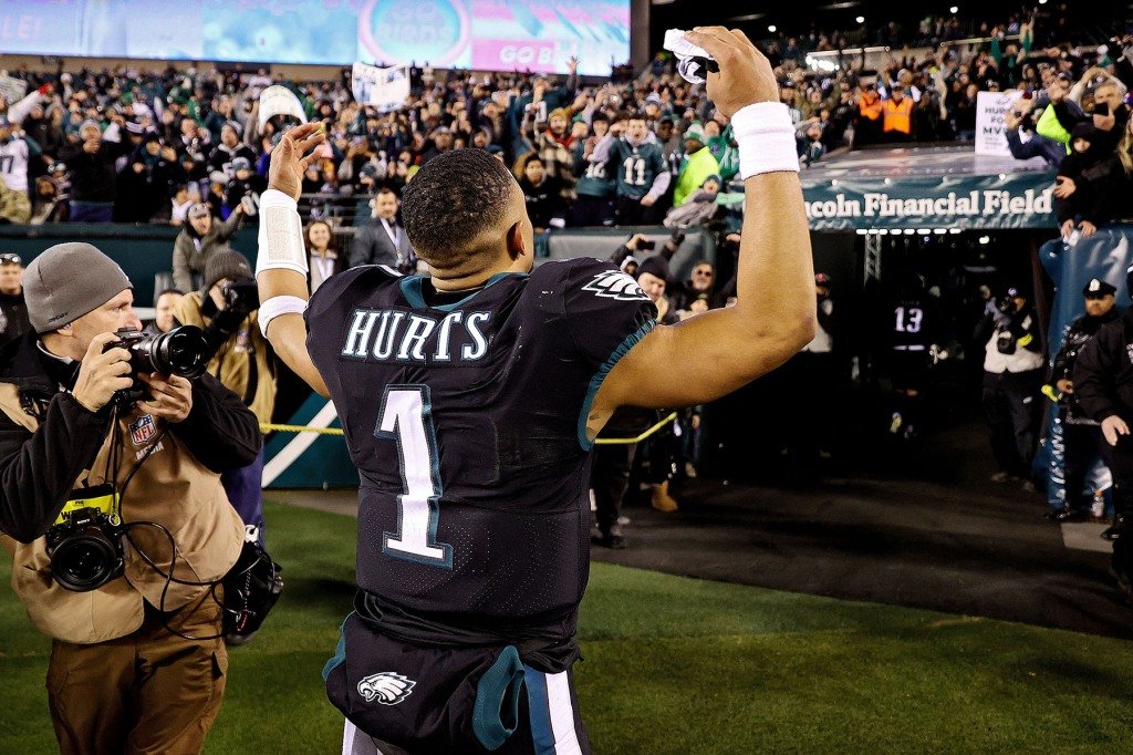 Jalen Hurts #1 of the Philadelphia Eagles celebrates to fans as he walks off the field after his team's 22-16 win against the New York Giants at Lincoln Financial Field on January 08, 2023 in Philadelphia, Pennsylvania.