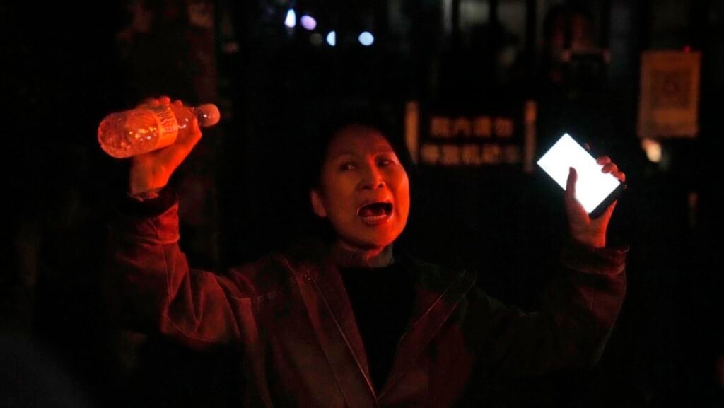 Mother says China protester released after 30 days’ detention