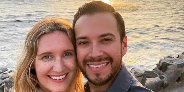 California public defender, Elliot Blair, and his wife, Kim, smile in a photo from a GoFundMe page.