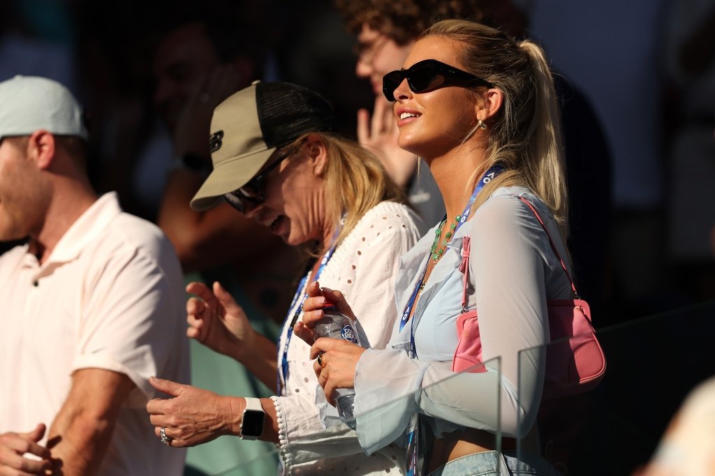 Paige Lorenze is seen watching Tommy Paul's match against Ben Shelton at the Australian Open on Jan. 25, 2023.