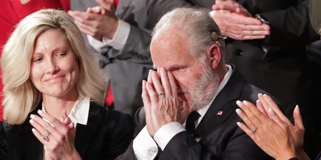 Conservative radio talk show host Rush Limbaugh reacts as he is awarded the Presidential Medal of Freedom during President Donald Trump's State of the Union address to a joint session of Congress in the House Chamber of the U.S. Capitol in Washington on Feb. 4, 2020. 