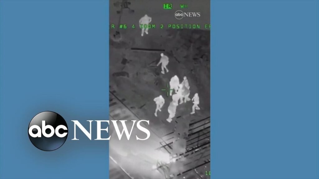 Police save suspect from path of oncoming train