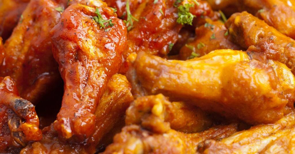 Chicago-area school official stole more than 11,000 cases of chicken wings, prosecutors say