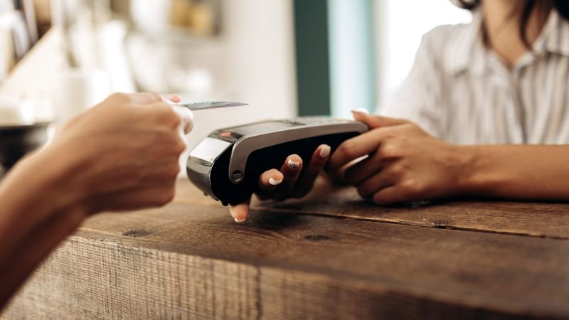 Americans are becoming ‘reluctant’ to make larger purchases, new Fed report shows
