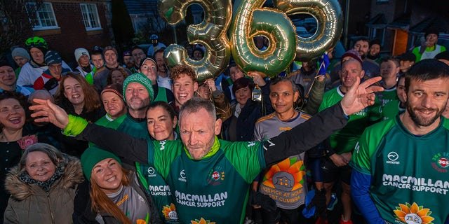 McKee celebrated with his community after he completed his 365 marathons and raised over a million pounds (about $1.2 million) for charity.