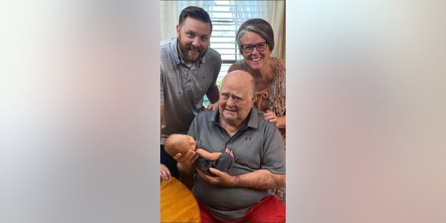 Four generations of one family: Hody Childress (center) poses with his daughter Tania Nix (right), his grandson Eric Hody Nix (left) and his great-grandson Bryson Nix (center, held by Hody Childress) in 2022.