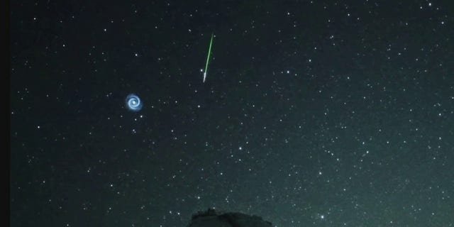The spiral moved quickly through the sky.