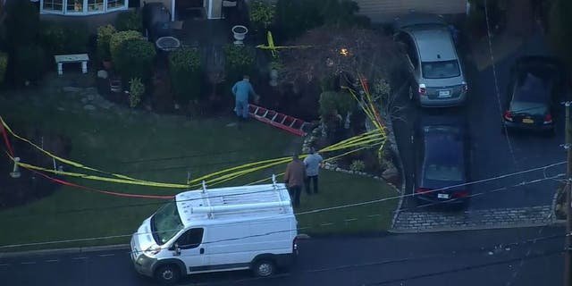 The Suffolk County Police Second Precinct reports that three people fell into a 6-foot sinkhole in Huntington Station on Jan. 26.