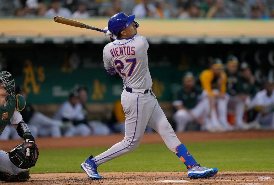 Mark Vientos hits an RBI single scoring Pete Alonso against the Oakland Athletics in the top of the second inning at RingCentral Coliseum on September 23, 2022 in Oakland, California.
