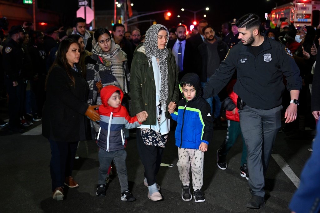 Fayaz's widow and two young boys