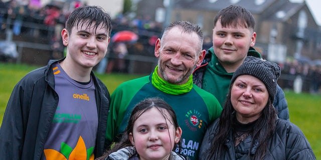 With the support of his loved ones, Gary McKee — shown here with members of his family — could "rest easy" knowing they were cheering him on.