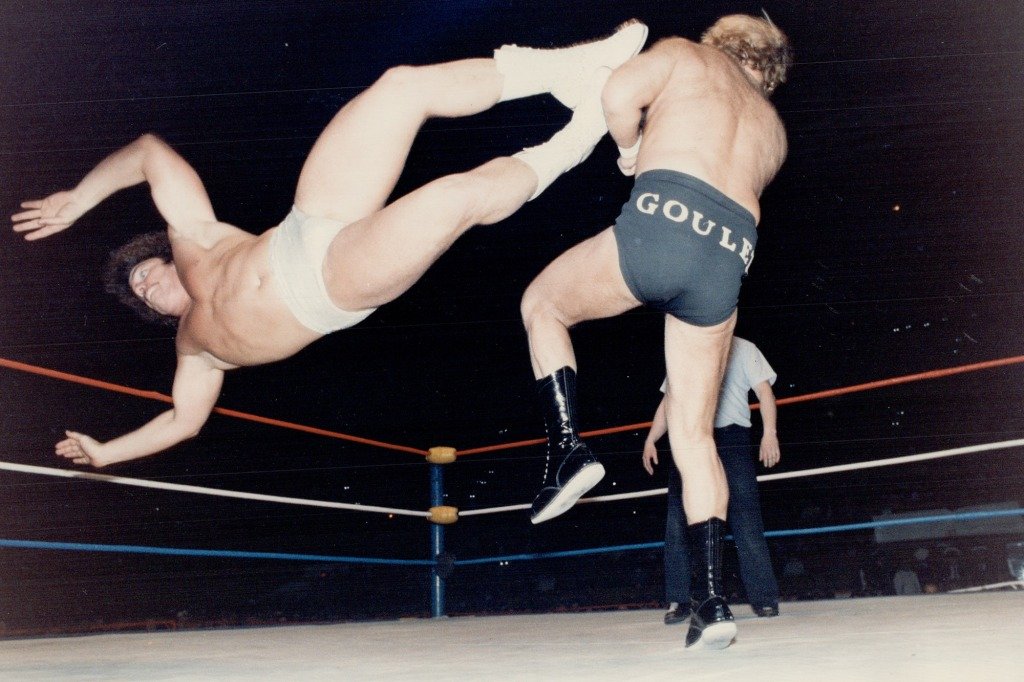 Lanny Poffo drop-kicks Rene Goulet.