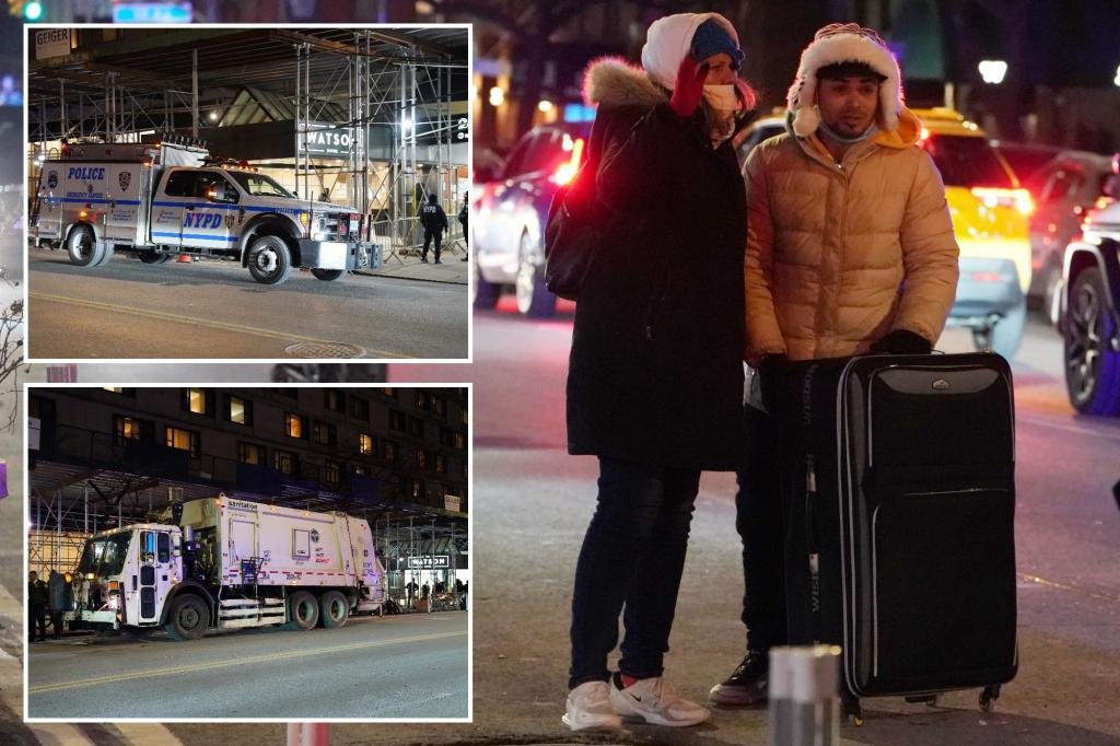 NYPD, Sanitation conduct sweep of migrants camped on street outside NYC hotel